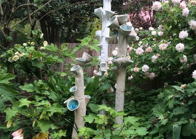 Osborne-Brown Installation A. Apothecium Cuppatea Arias  This is the largest of the apotheciums.  It has large cup like aci that carries spores similar to the Bird’s Nest Fungi of Costa Rica. 18”d x 74”h. Stoneware